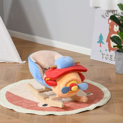 Kids plush rocking horse toy with blue body, red saddle, and light wood base