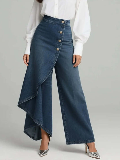 Medium blue denim straight-leg pants with asymmetrical ruffle overlay and front buttons