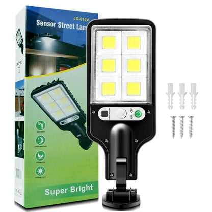 Black solar LED street light with mounting base, lamp panel, and included screws