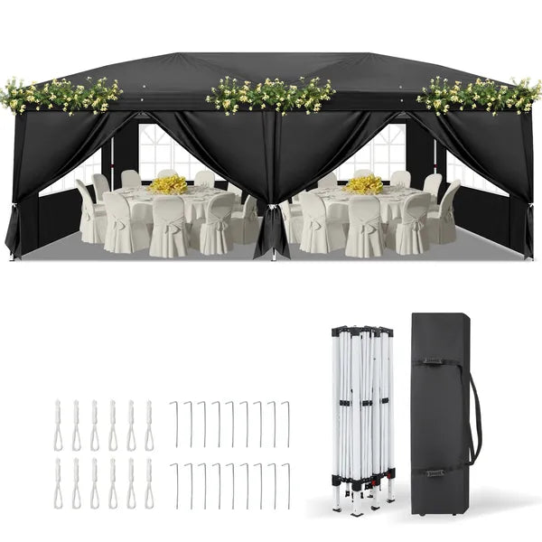 Black pop-up canopy tent front with side curtains and table setup