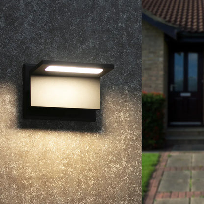 Black modern outdoor wall sconce with rectangular frosted diffuser and bright LED glow