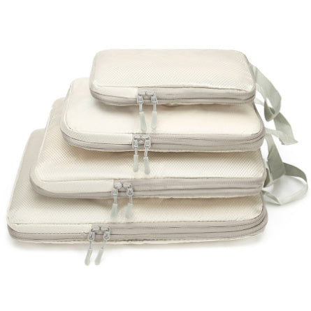Compression bag set with three zippered storage pouches, white fabric