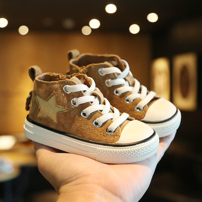 Baby brown high-top canvas shoes with white laces and white rubber sole