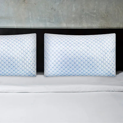 Two queen memory foam pillows with light blue hex-patterned covers, side view