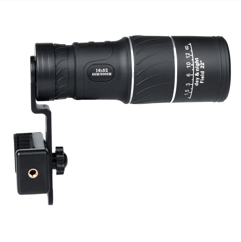 Black monocular telescope with attached mount on a white background