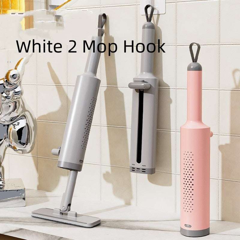 White 2 Mop Hook with mop attachments on a tiled wall.