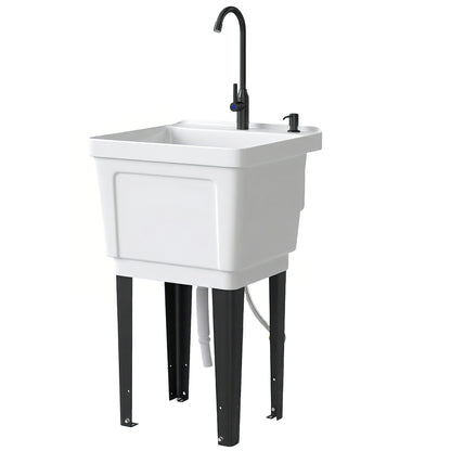 White freestanding utility sink with black faucet and visible drain hose outlet
