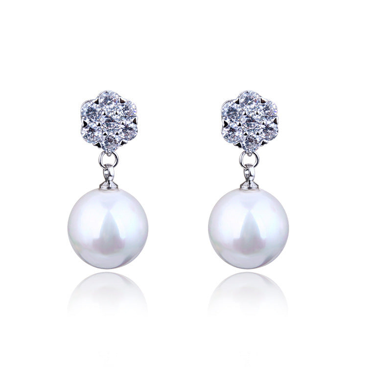 Round pearl long earrings