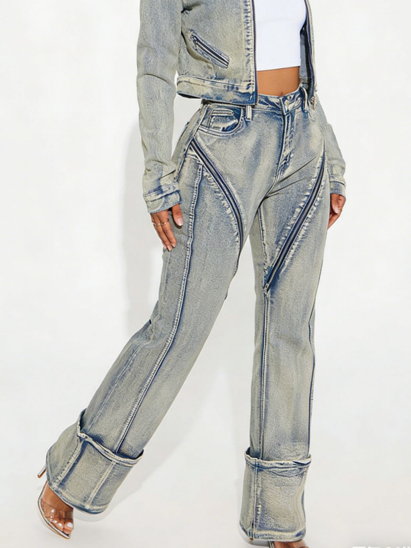 Washed denim pants in light blue with contrast seam panels and tapered legs