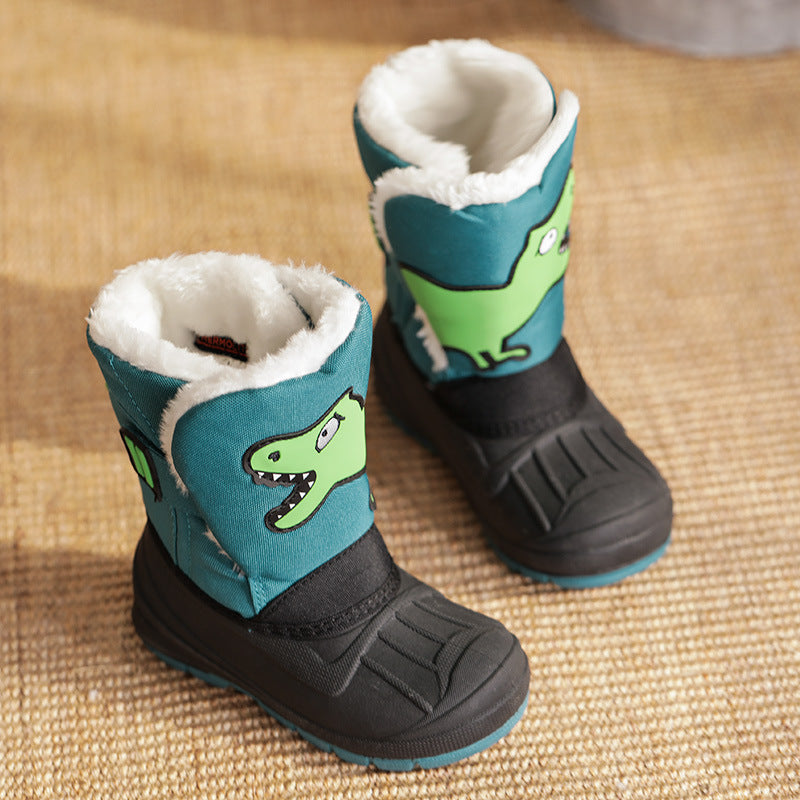 Kids winter snow boots in teal with dinosaur graphic, black sole, and white fleece