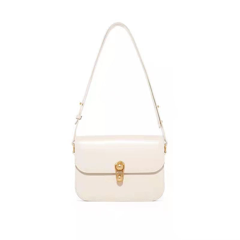 Milkshake white leather shoulder messenger bag with front flap and gold-tone clasp