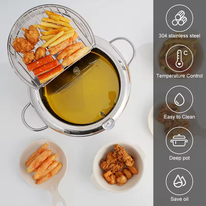 Stainless steel deep fryer with wire basket, thermometer, and oil-filled pot