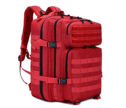 Red tactical backpack angled view with front straps, top handle, and small wheels