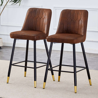 Brown bar stool with tufted back and padded seat, black legs, gold accents, open footrest
