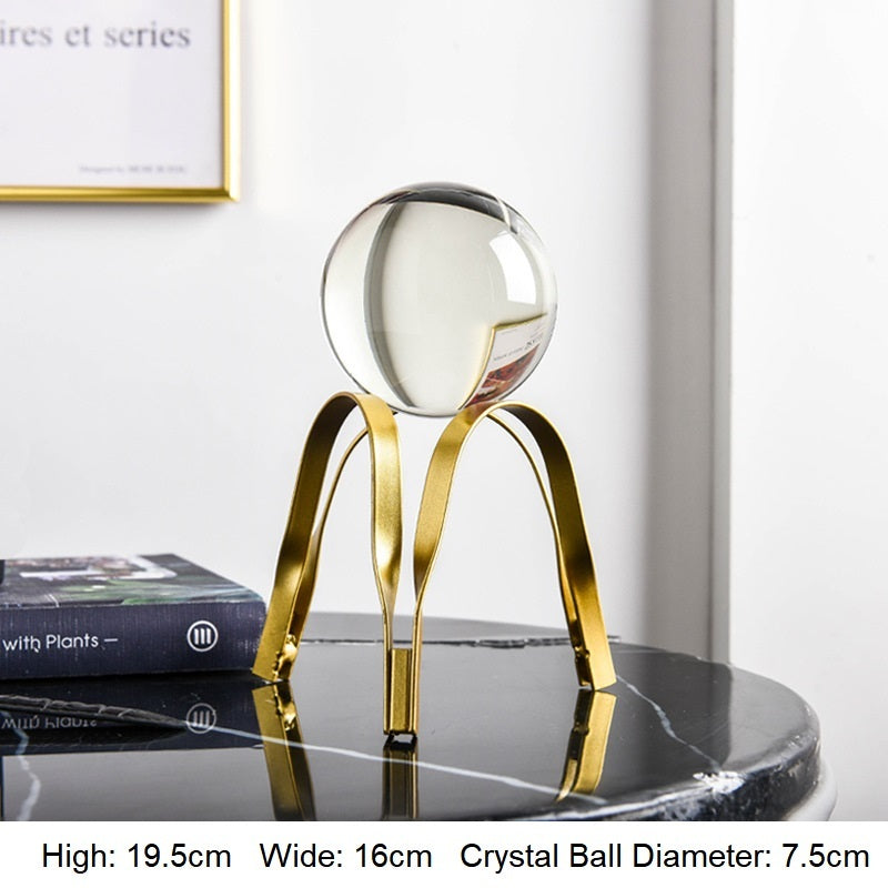 Gold crystal ball ornament with arched frame base; 19.5cm high