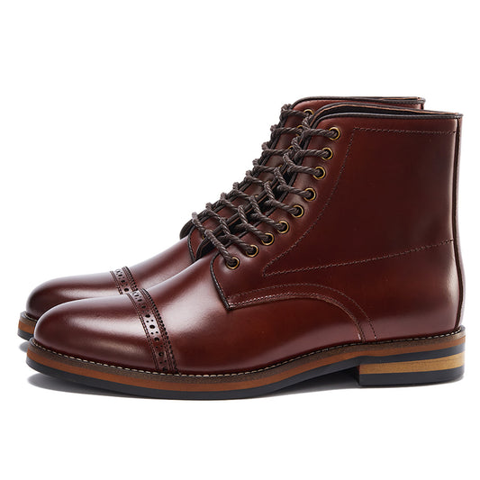Brown leather boots with laces on a white background