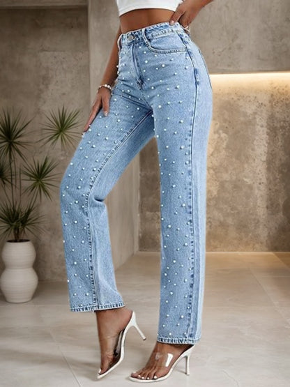 Light blue straight-leg jeans with white bead embellishments and ankle-length hem