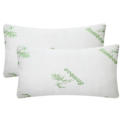 Pair of white bamboo memory foam pillows with subtle green bamboo leaf pattern