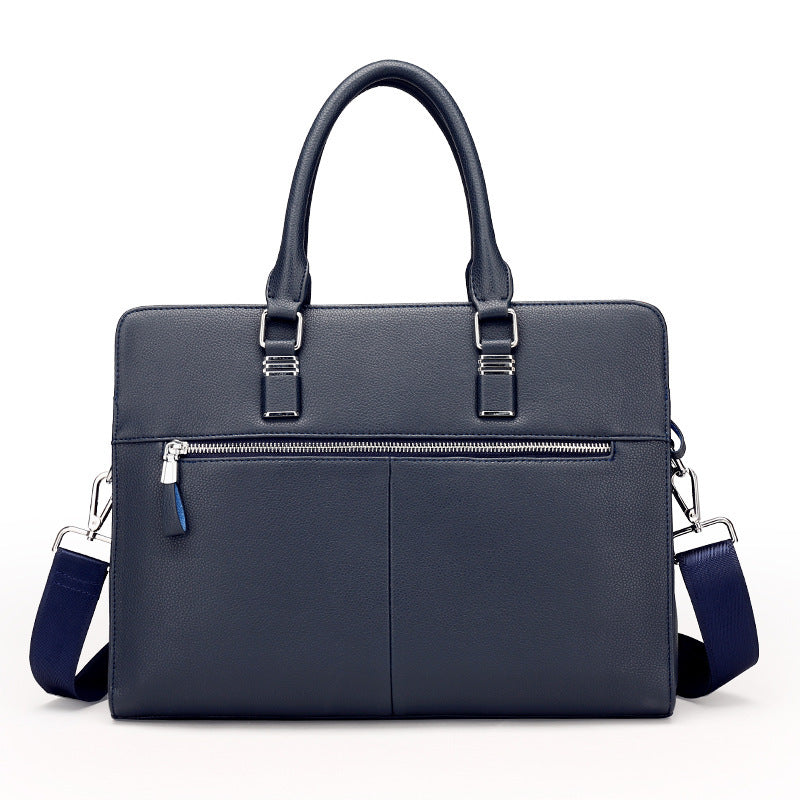 Dark blue leather shoulder bag with top handles, front zip pocket, and side straps.