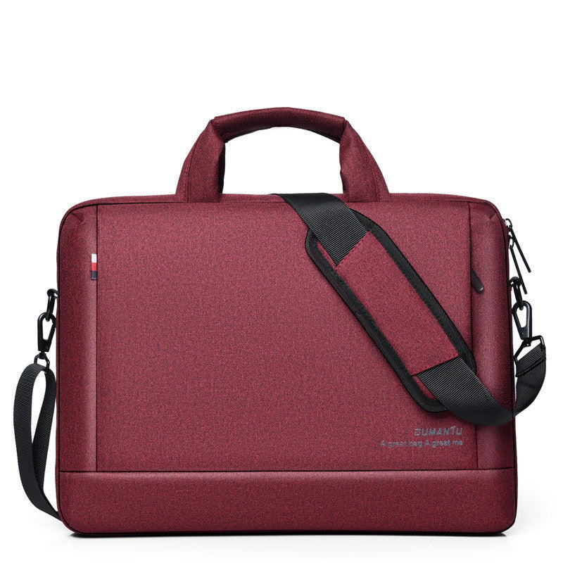 Red laptop bag with top handle, diagonal shoulder strap, and zip side pockets