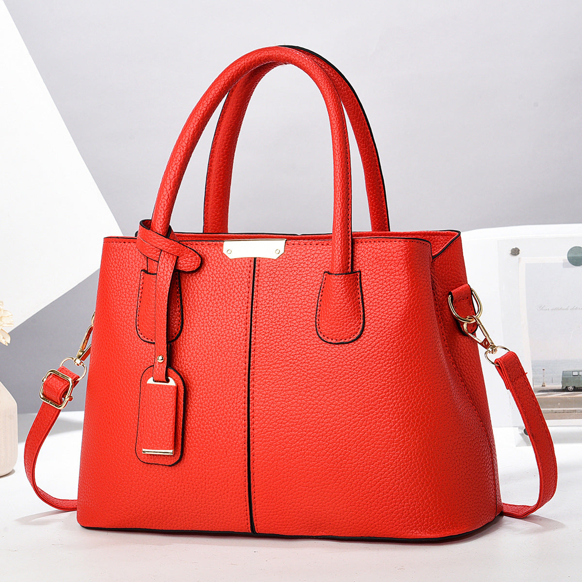 PU leather tote & crossbody bag, bright red with dual handles and adjustable shoulder strap