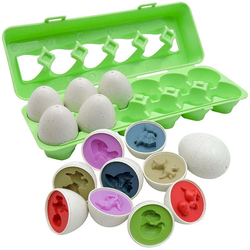 Set of silicone egg molds with various animal shapes in a green carrying case.