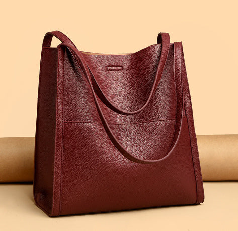 Large commuter tote bag, deep red leather look, double top handles, front pocket