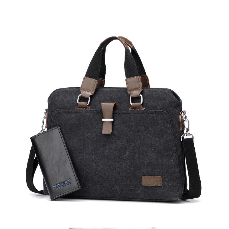 Canvas briefcase in black with left wallet pocket and shoulder strap, dual handles, front clasp