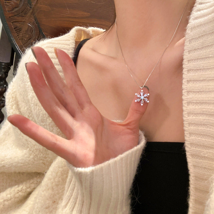 Silver-tone delicate necklace with snowflake charm pendant and fine chain