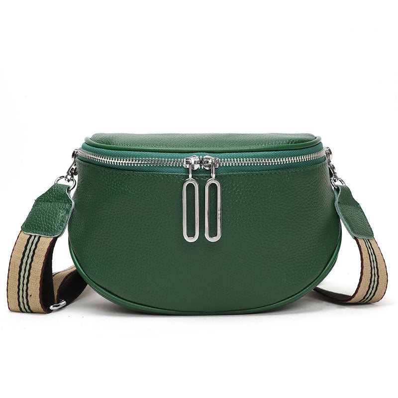 Cowhide casual shoulder bag in deep green with double-zip pulls and striped webbing strap.