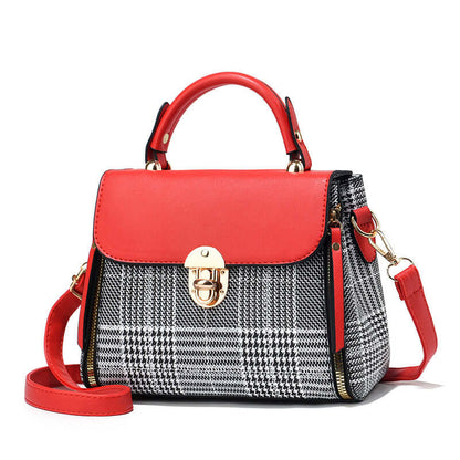 Red and gray houndstooth envelope shoulder tote with gold clasp and adjustable strap