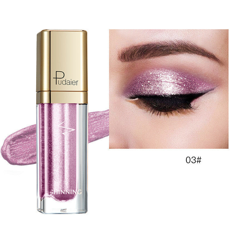 Glitter eyeshadow tube with mauve purple shimmer and matching eyelid swatch, Tudaier