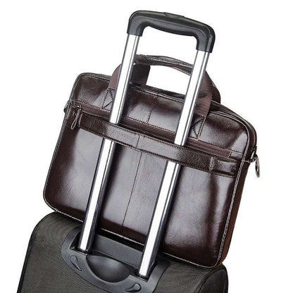 Leather business briefcase with telescoping handle slot and top carry handle