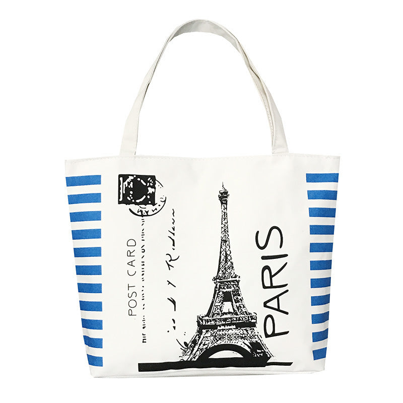 Canvas shoulder bag with Eiffel Tower print and “PARIS” text on white canvas