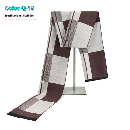 Plaid scarf with brown and white pattern on a stand against a white background