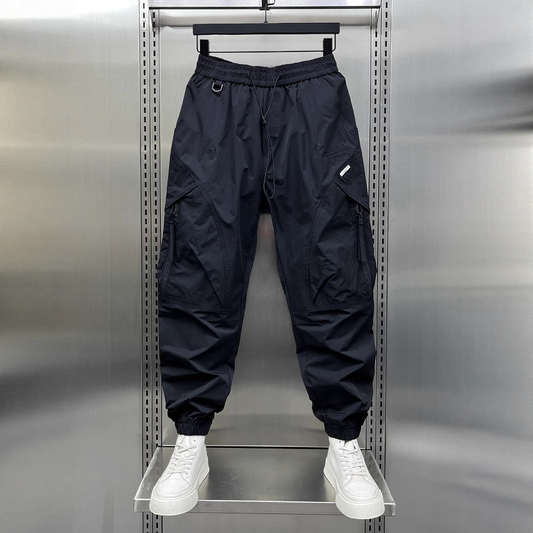 Men's tapered cropped pants, dark navy, elastic waist with cargo-style pocket details