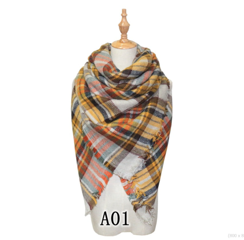 Plaid scarf with frayed edges, yellow blue and white; A01 tag on display