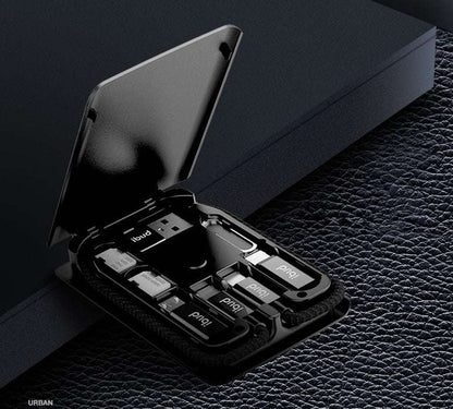 Black key organizer with compartments on a dark textured surface