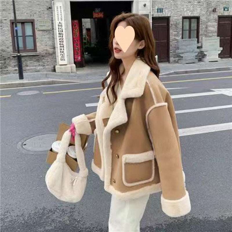 Women’s suede biker jacket in tan with cream sherpa collar and front snap placket.