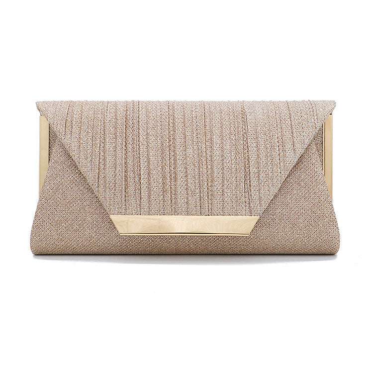 Champagne textured clutch with gold-tone clasp bar on front flap