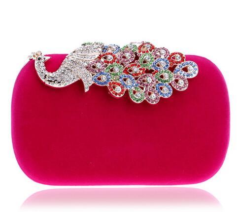 Pink velvet oval clutch with multicolor jewel floral fan clasp