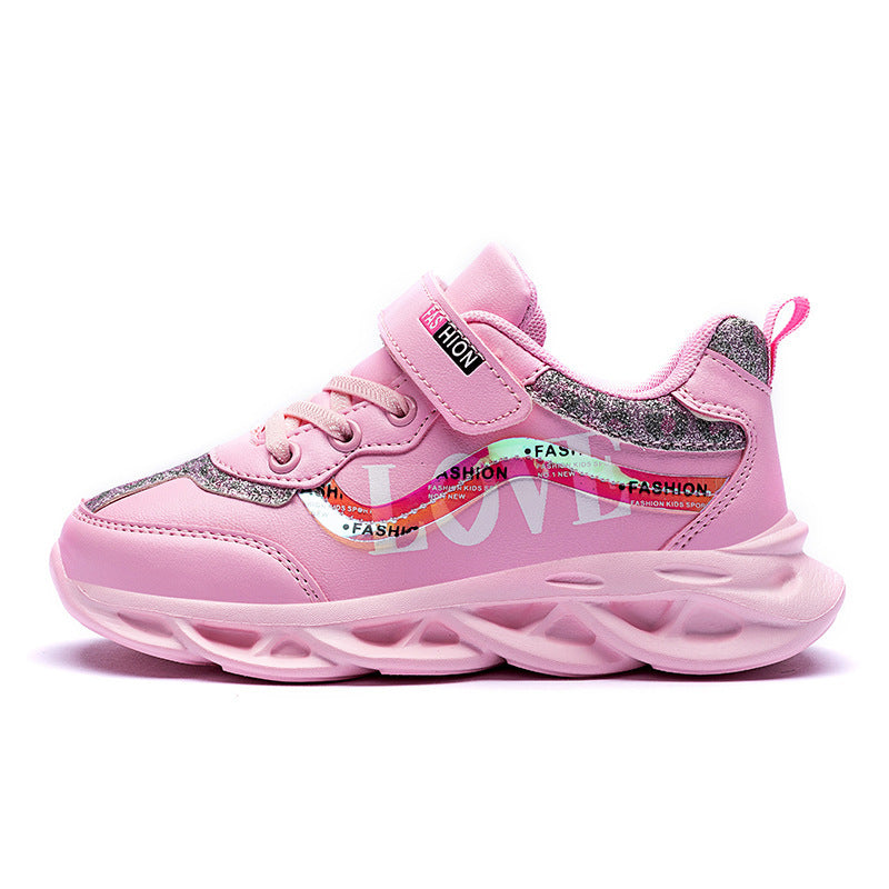 Girls' pink chunky sneakers with Velcro strap, lace-up eyelets, and grippy tread sole