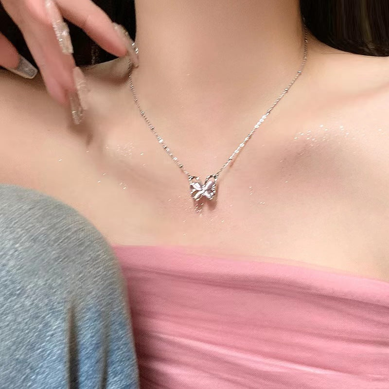 Butterfly pearl necklace with butterfly pendant on a fine silver chain