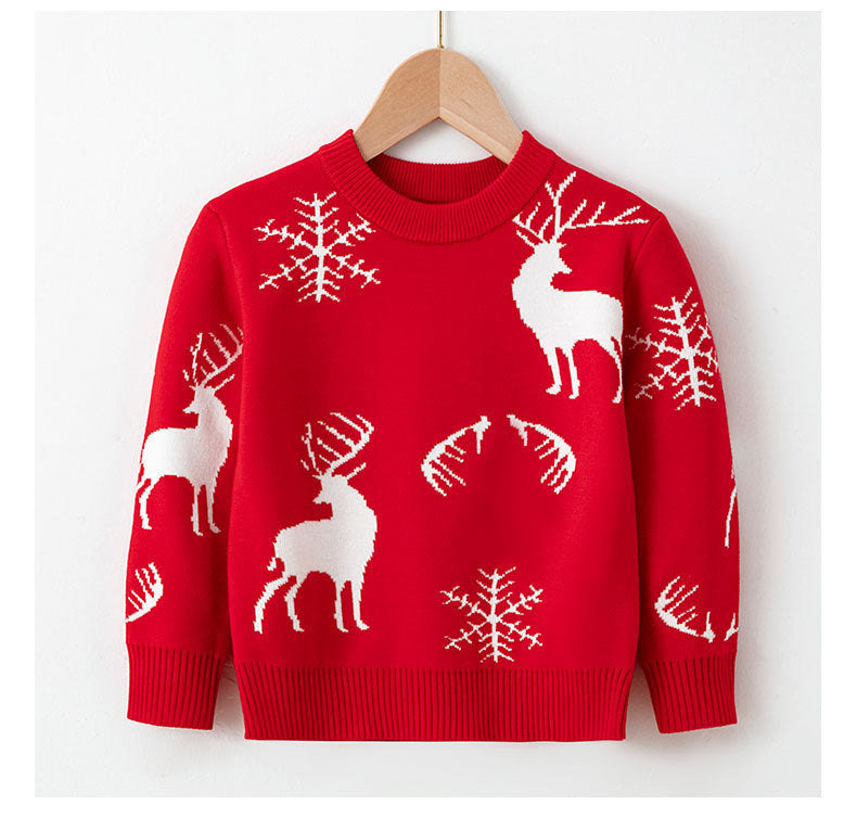 Kids red Christmas sweater with white reindeer, snowflakes, and candy-cane motifs