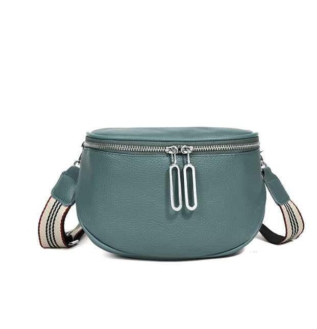 Cowhide casual shoulder bag in dark green with double-zip pulls and striped webbing strap.