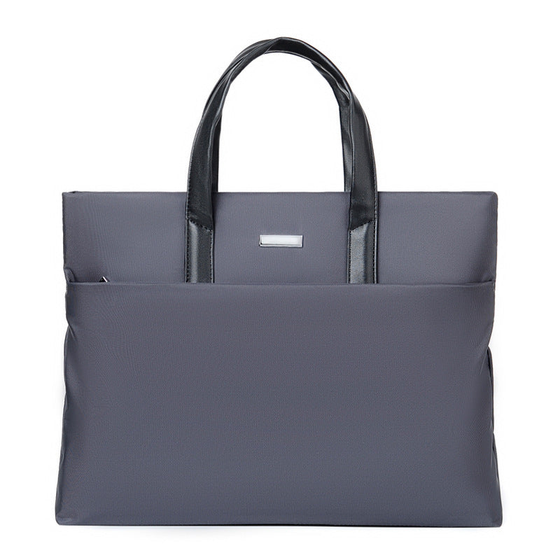 Men's casual messenger bag, gray with top handles and front logo plate