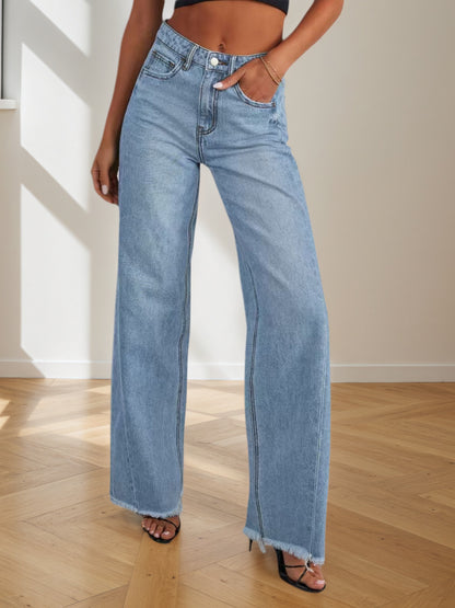 Women's light blue wide-leg denim pants with button fly and wide flared legs.