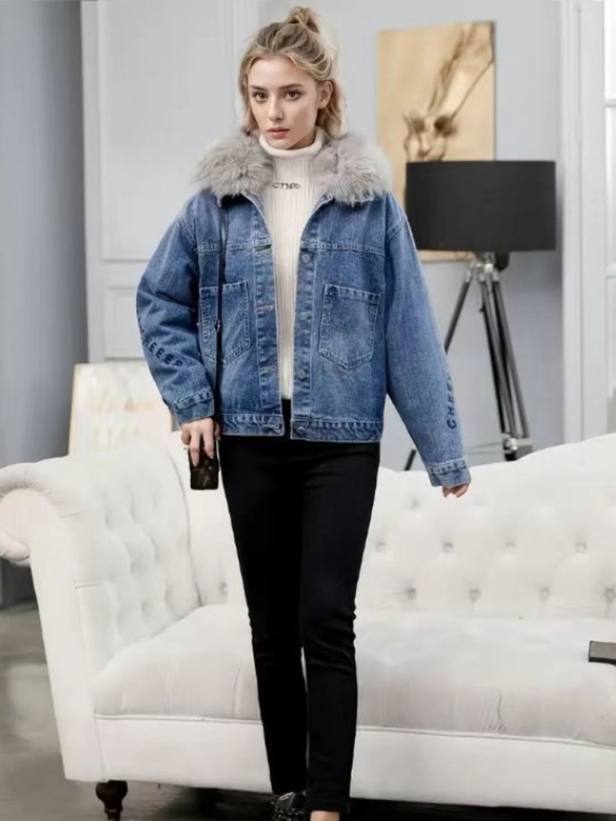 Women’s light blue denim jacket with faux fur collar and fleece-lined front zipper
