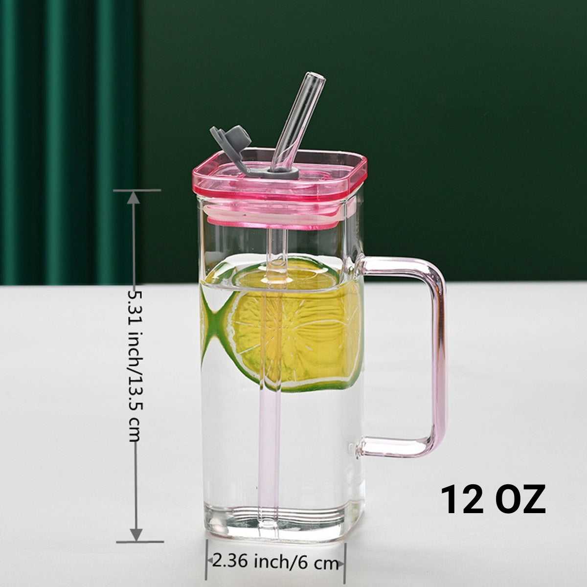 Clear square glass cup with pink lid and two straws; 12 oz size shown