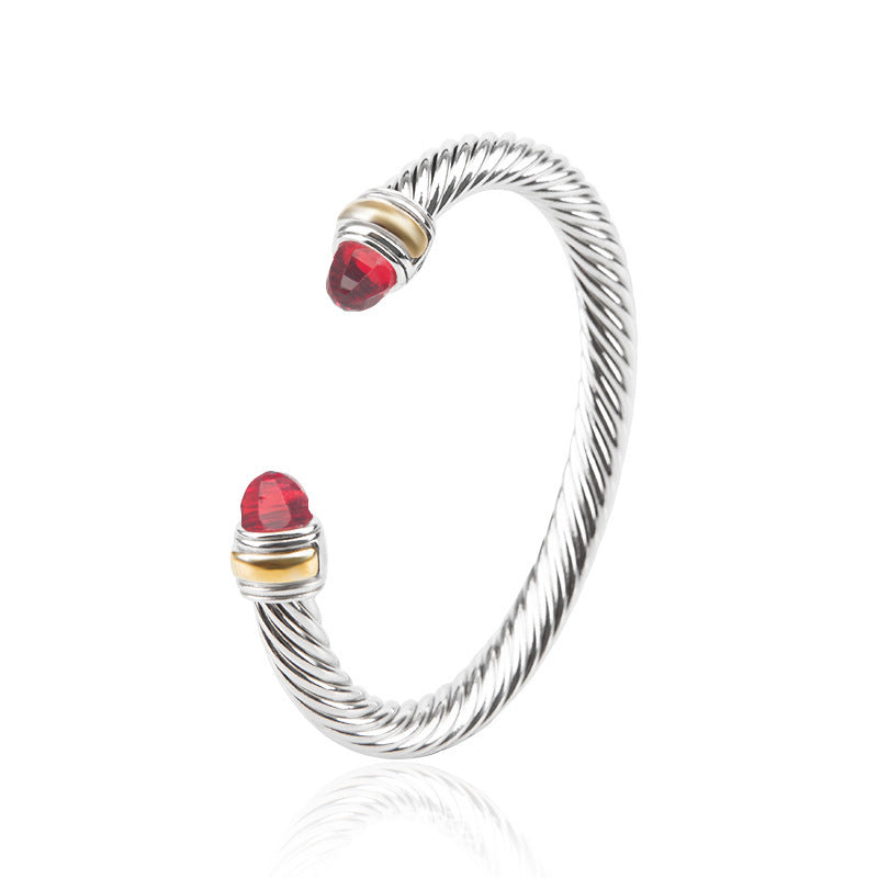 Bohemian bracelet with silver wire and red faceted crystal beads with gold accents